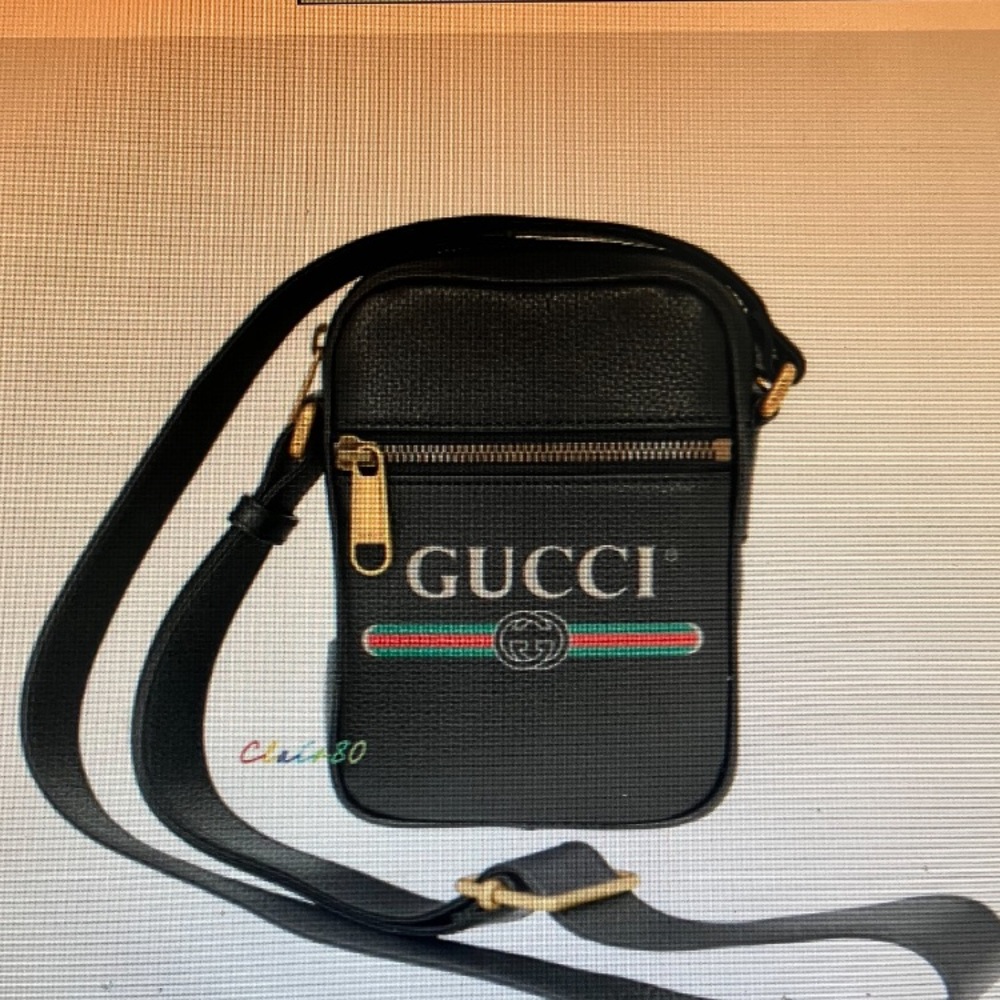 Authentic Gucci black cross body. Barely used excellent condition